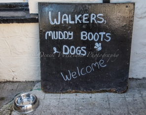 Welcoming sign outside the pub at Cadgwith, Cornwall